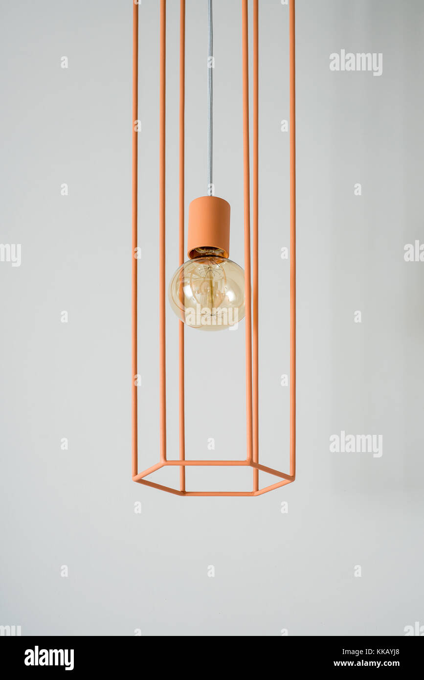 Hanging orange edison lamp Stock Photo