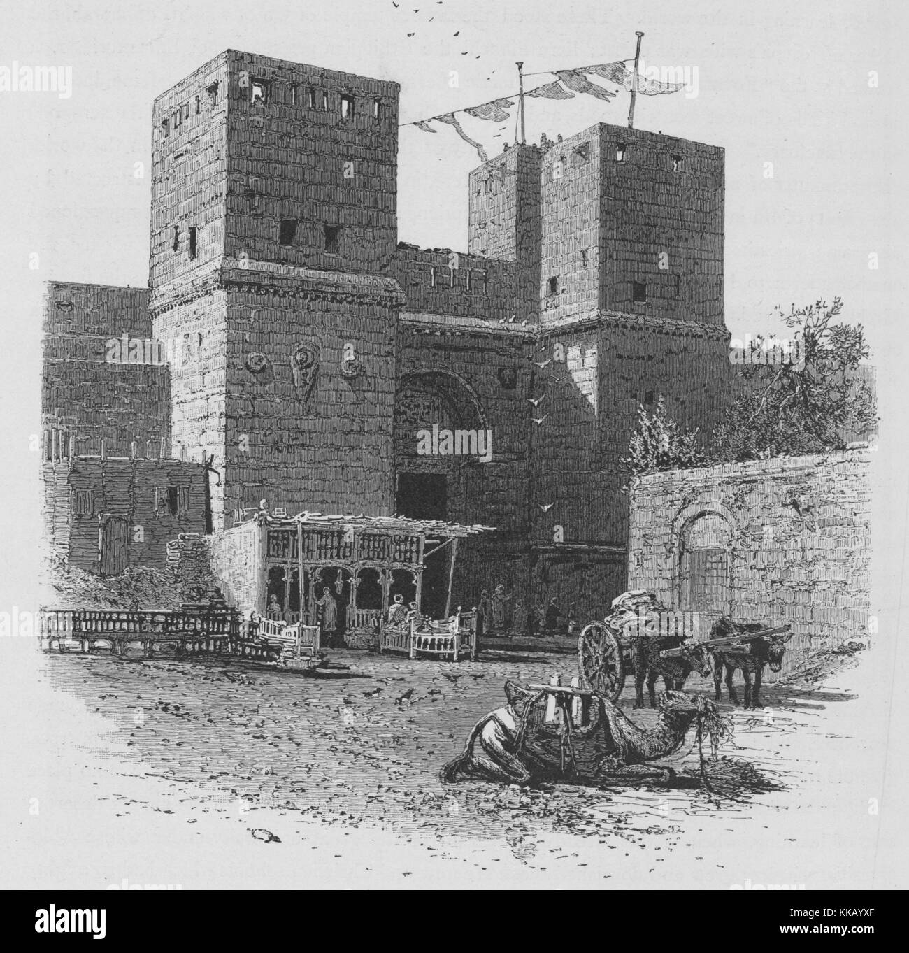 Wood engraving depicting a large stone wall, with an entrance, a camel and a cart pulled by oxen, in the foreground, titled 'The gate of victory (Bab-en-Nasr) The easternmost of the northern gates of Cairo, It was built in the reign of the Fatimy khalif El-Mustansir, AH 480 (AD 1087)', from the book 'Picturesque Palestine, Sinai, and Egypt', by Sir Charles William Wilson, 1882. From the New York Public Library. Stock Photo