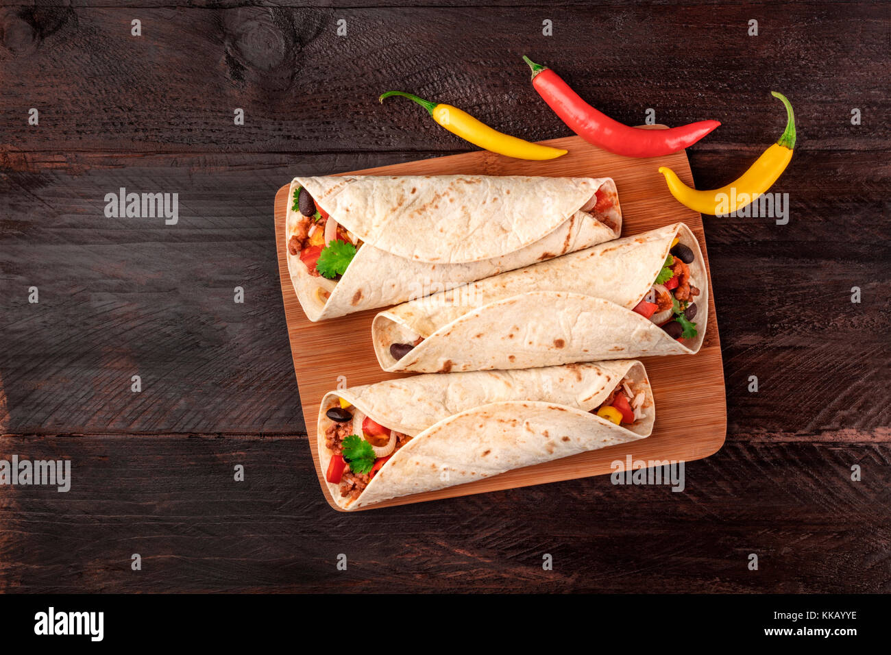 Mexican burritos with chili peppers, and copyspace Stock Photo Alamy
