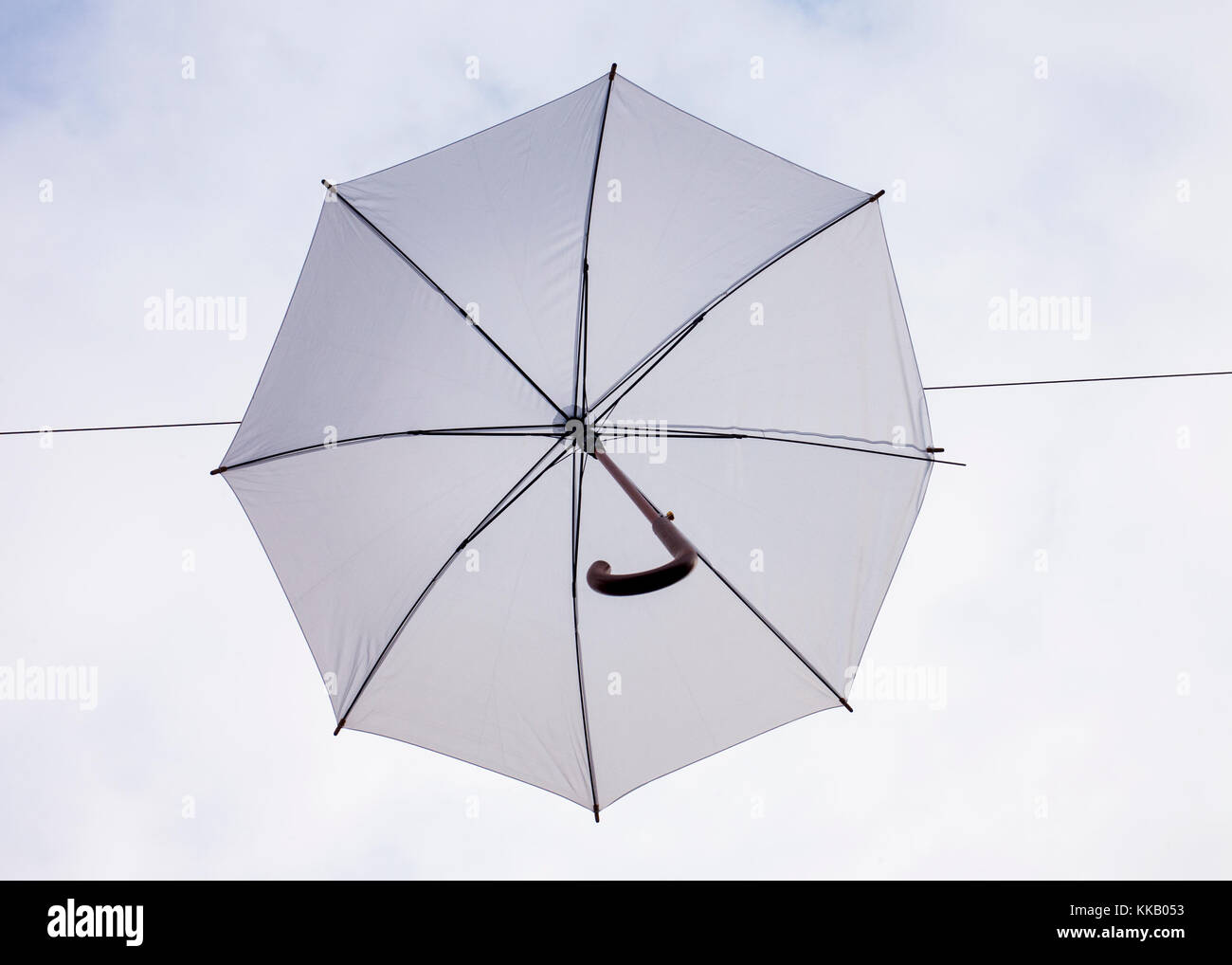 white umbrella hanging in Odense street Denmark Stock Photo Alamy
