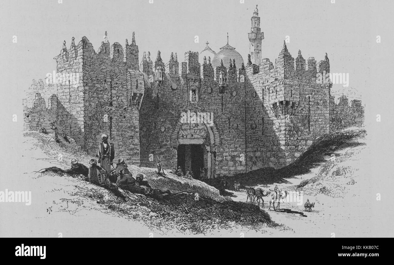 Wood engraving depicting a large stone wall, with an entrance, people on camels, and resting on the ground, in the foreground, titled 'The Damascus Gate - Bab el Amud (Gate of the Column), the northern entrance to Jerusalem', from the book 'Picturesque Palestine, Sinai, and Egypt', by Sir Charles William Wilson, 1882. From the New York Public Library. Stock Photo