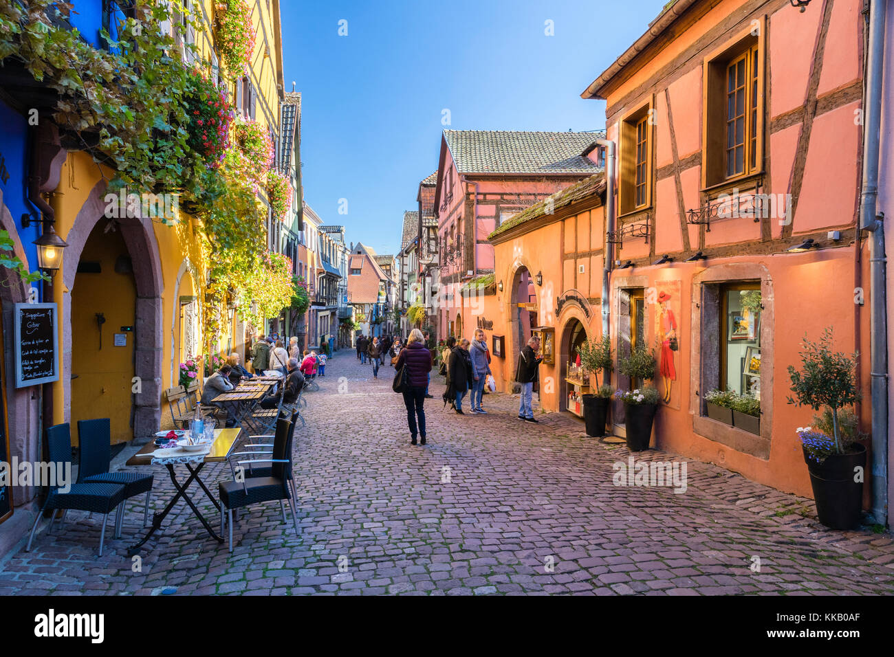 Small street with gastronomy, Riquewihr, Alsatian Wine Route, Alsace, Département Haut-Rhin, France Stock Photo