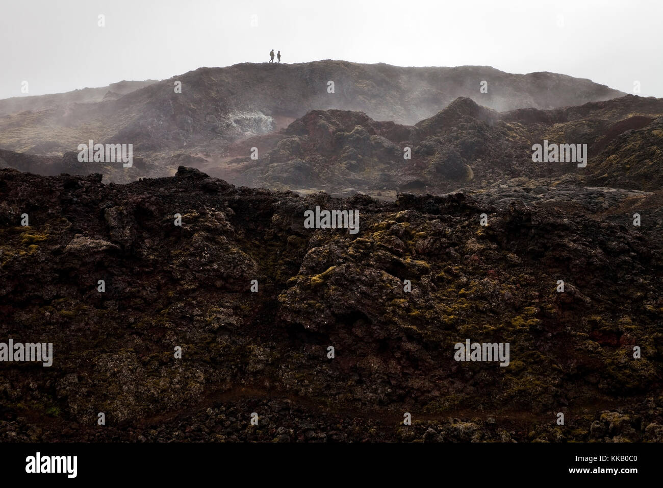 People in the lava field, Volcano Krafla, Northern Iceland, Iceland Stock Photo