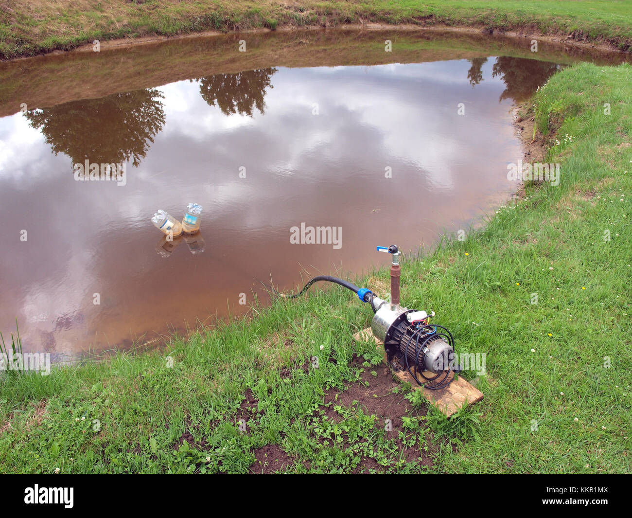 Centrifugal electric water pump outdoor on pond coast Stock Photo Alamy