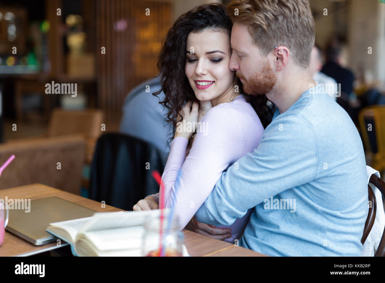 Young couple on date in coffee shop Stock Photo
