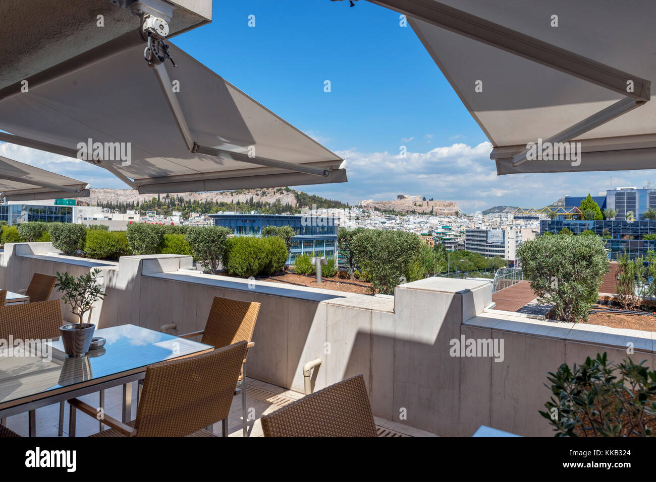 View over the city looking towards the Acropolis from the terrace of the Executive Lounge, Athenaeum Intercontinental Hotel, Athens, Greece Stock Photo