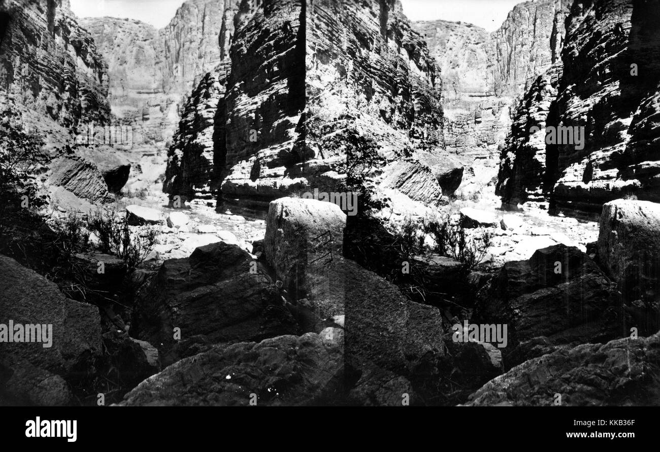 Stereograph of the tall walls of a canyon through which the Kanab Creek runs. Image courtesy USGS. 1875. Stock Photo