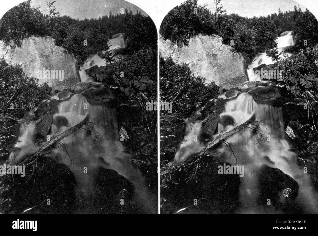 Stereograph of water flowing over rocks on the right fork of the Teton River, Wyoming. Image courtesy USGS. 1872. Stock Photo