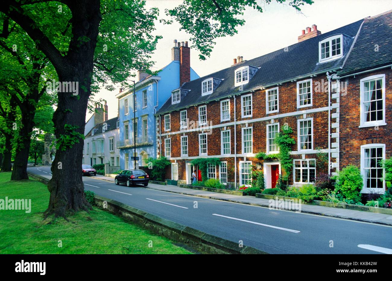 Victorian and houses lead to Priory Gate at the east end