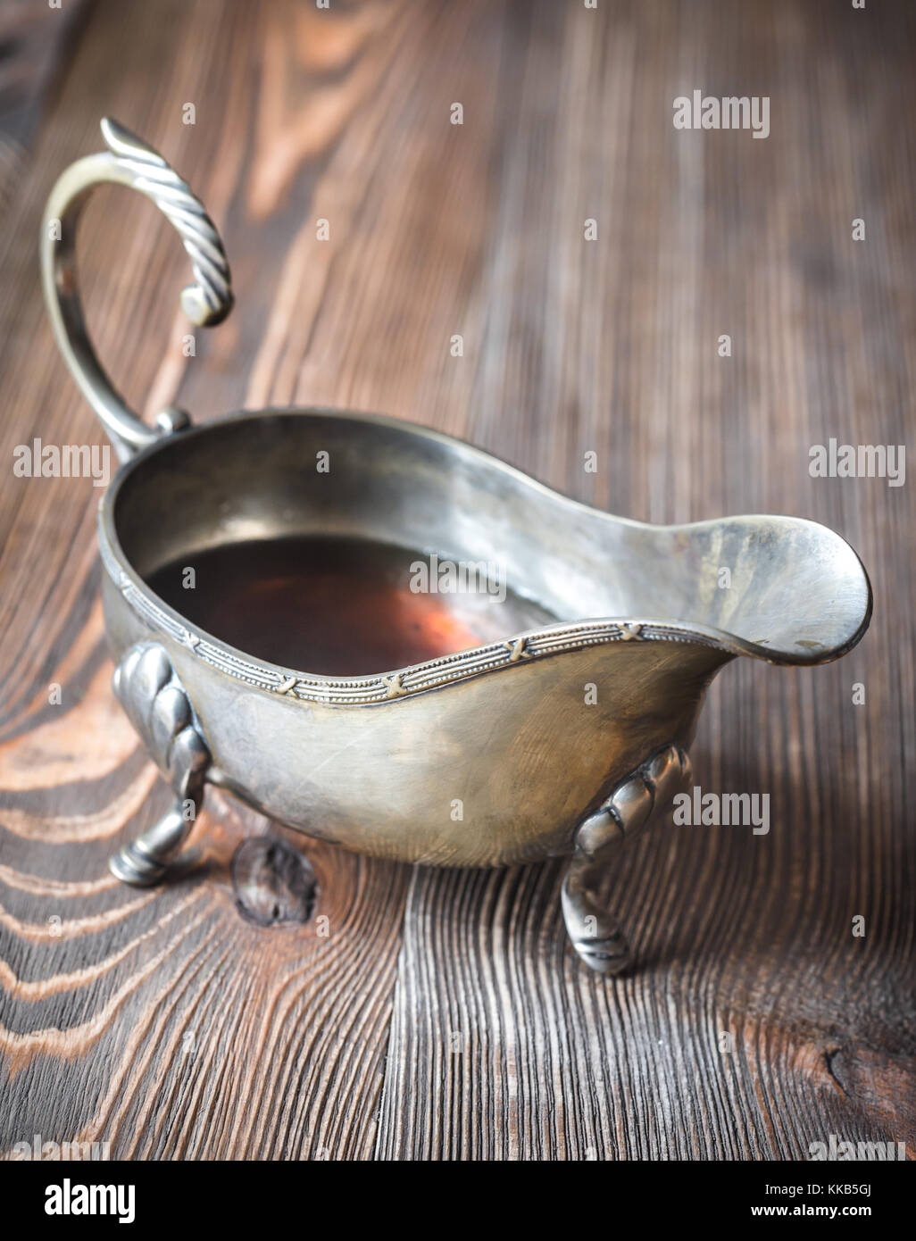 Maple syrup in vintage sauce boat Stock Photo