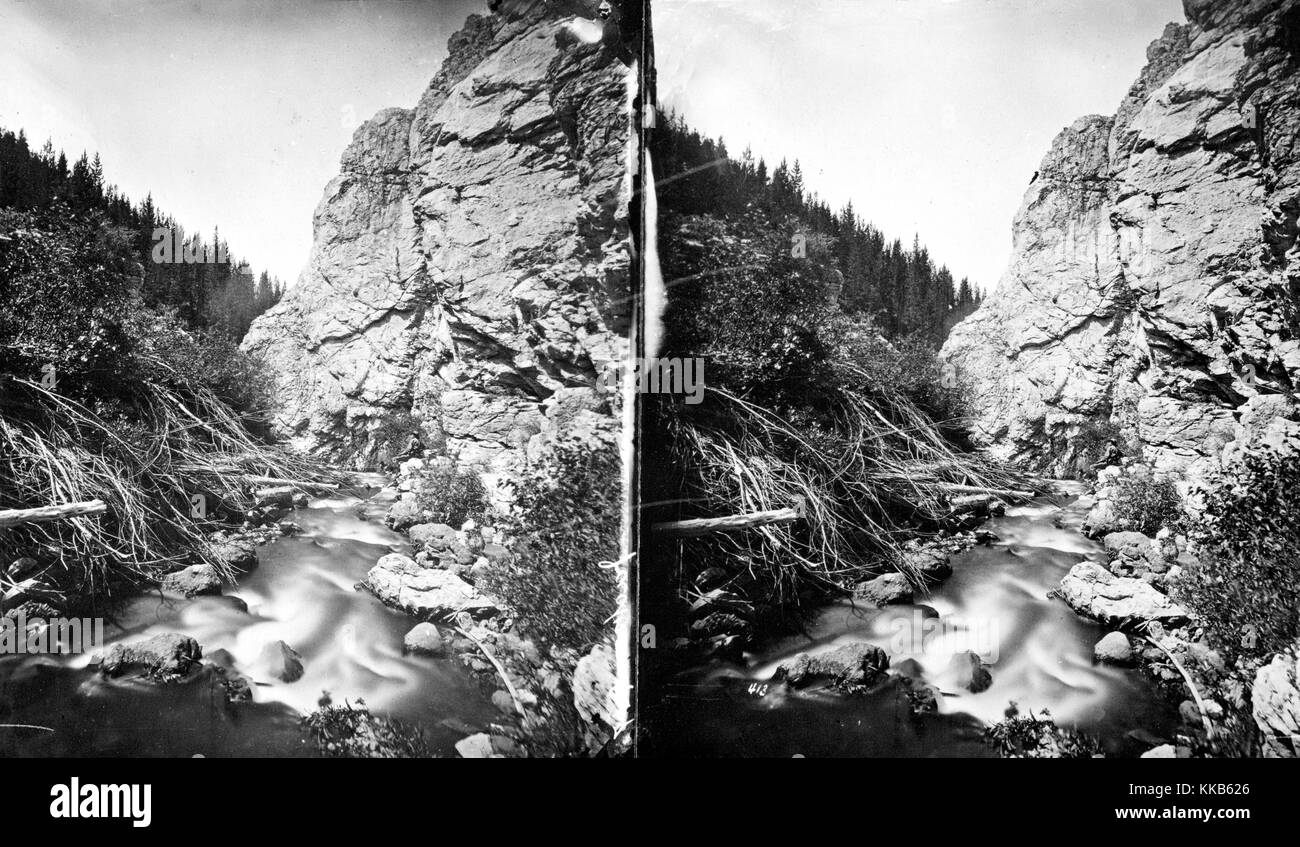 Stereograph of water flowing through a canyon south of Mystic Lake