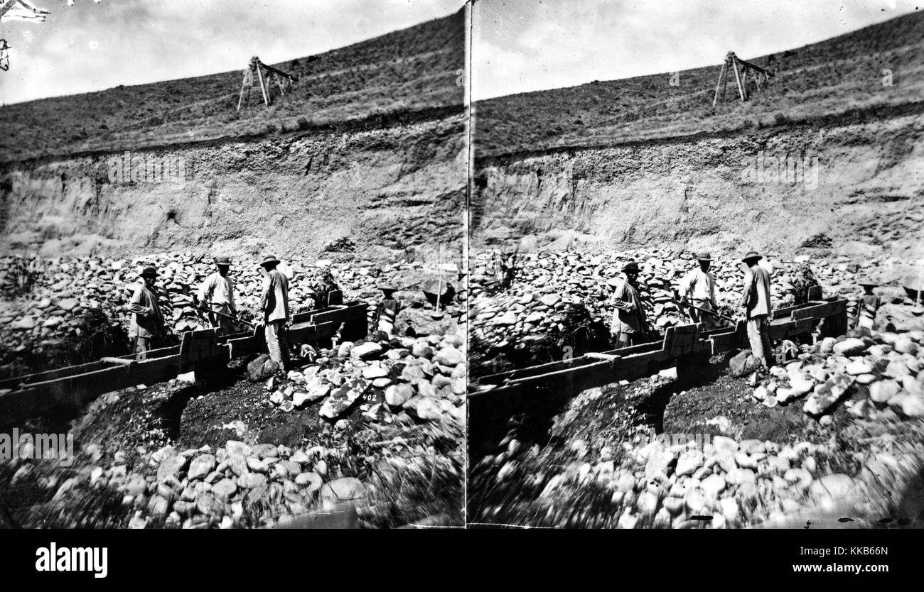 A stereograph of Chinese miners sluicing, Madison County, Montana, 1871. Image courtesy USGS. Stock Photo