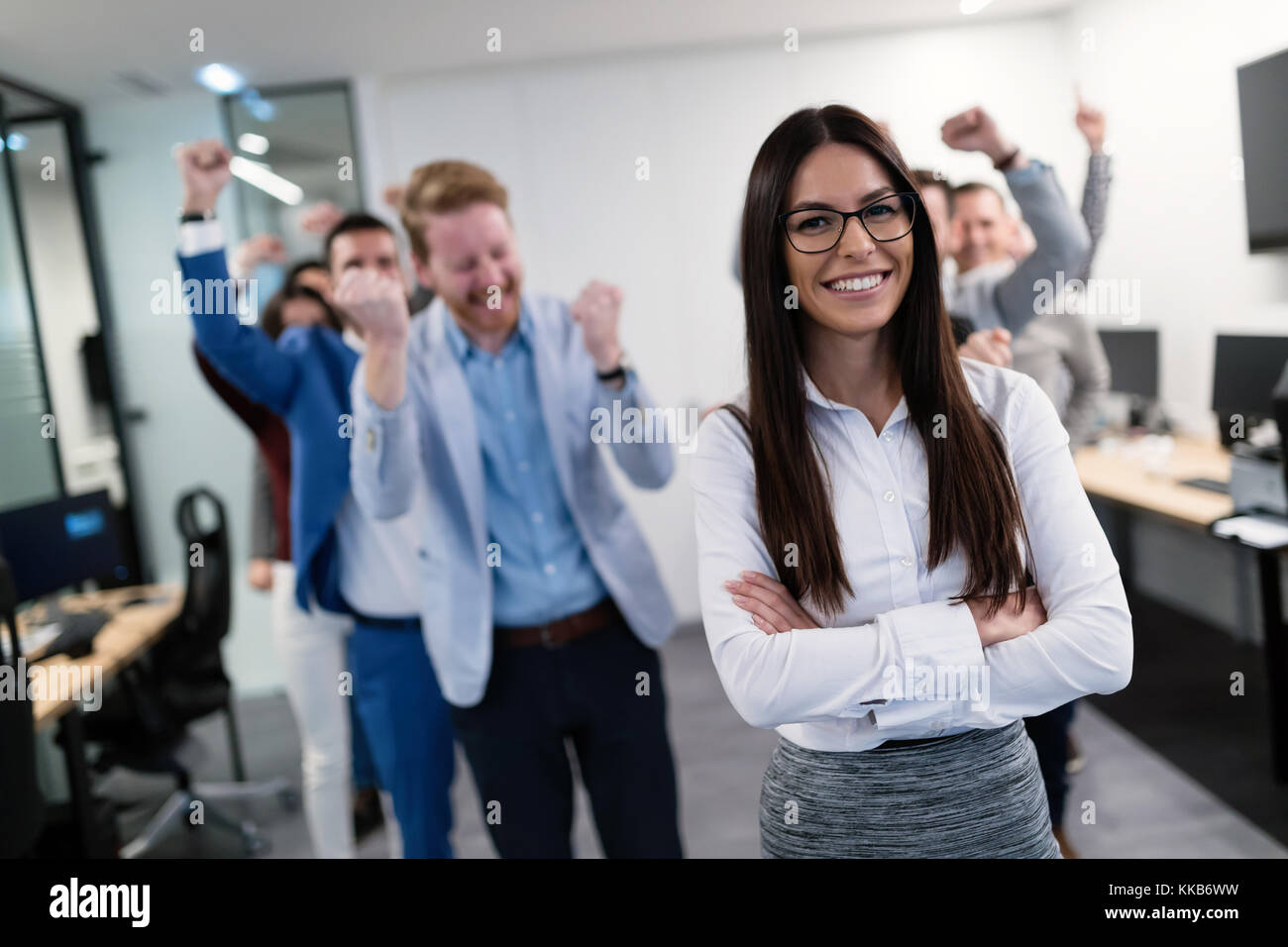 Group picture of business team posing in office Stock Photo - Alamy