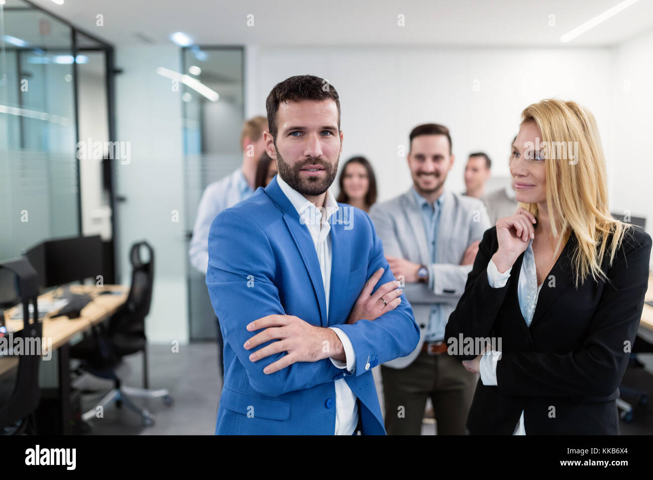 Group picture of business team posing in office Stock Photo - Alamy