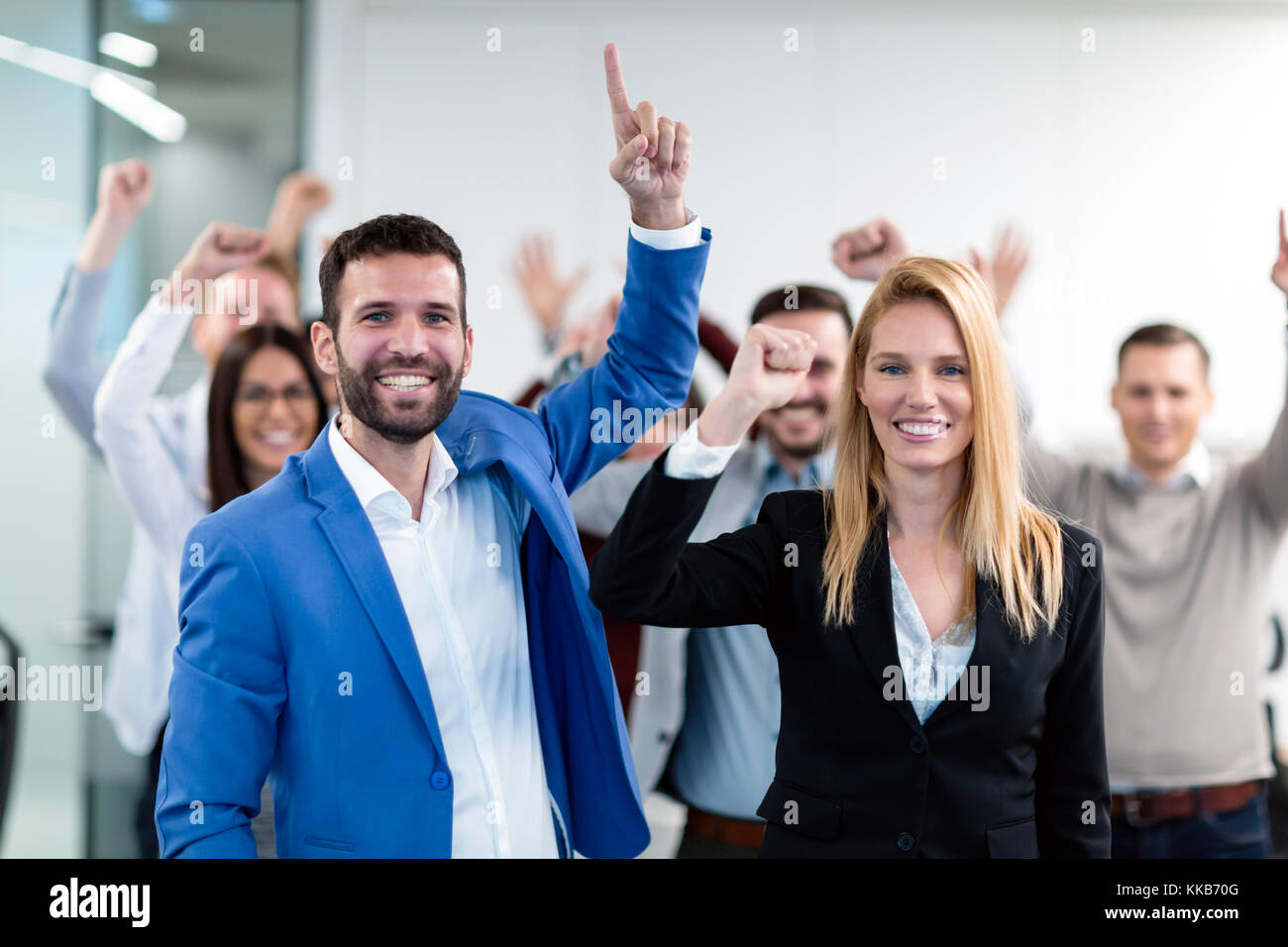 Group picture of business team posing in office Stock Photo - Alamy