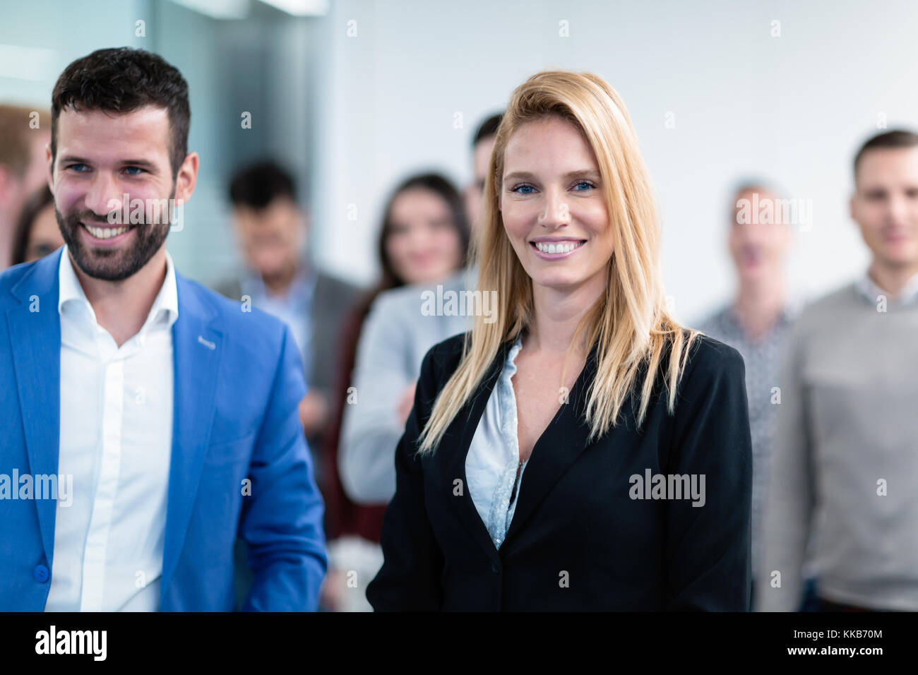 Group picture of business team posing in office Stock Photo - Alamy