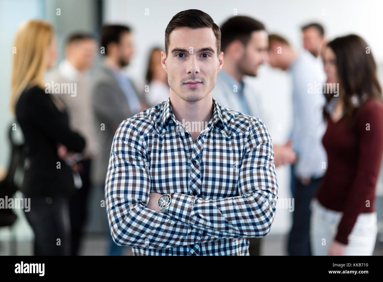 Group picture of business team posing in office Stock Photo - Alamy
