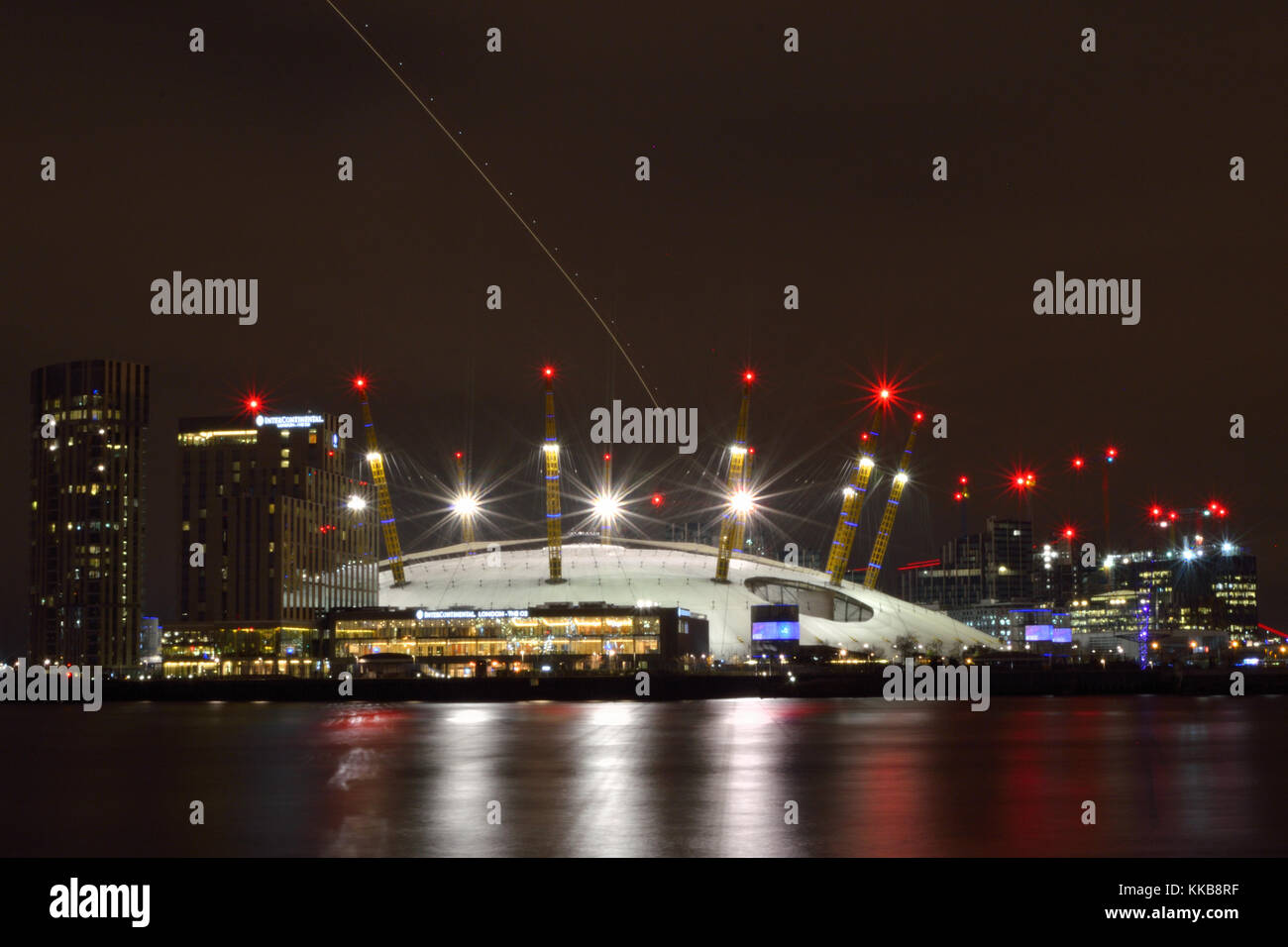 Night view across the river Thames towards the O2 Arena Stock Photo