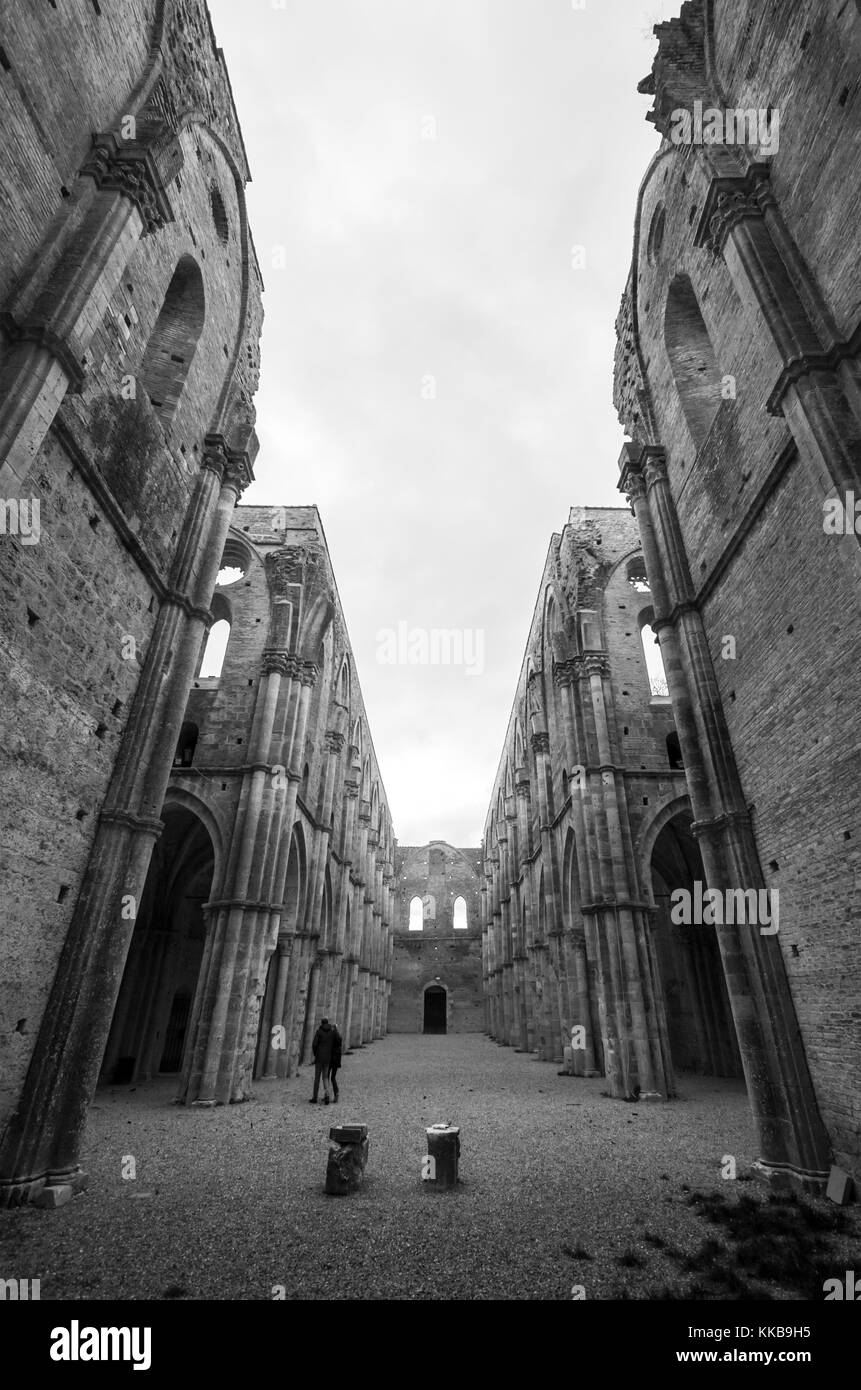 Abbey of Saint Galgano (Italy) - An old cistercian catholic monastery in a isolated valley of Siena province, Tuscany region. The roof collapsed after Stock Photo