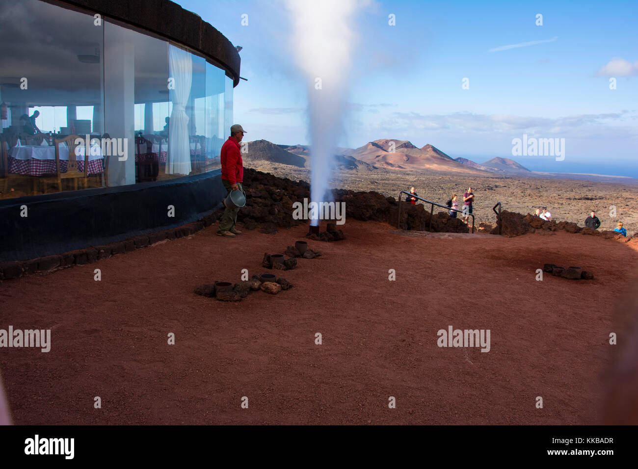 demonstration of steam coming out of a pipe set in the lava at timanfaya national park lanzarote Stock Photo