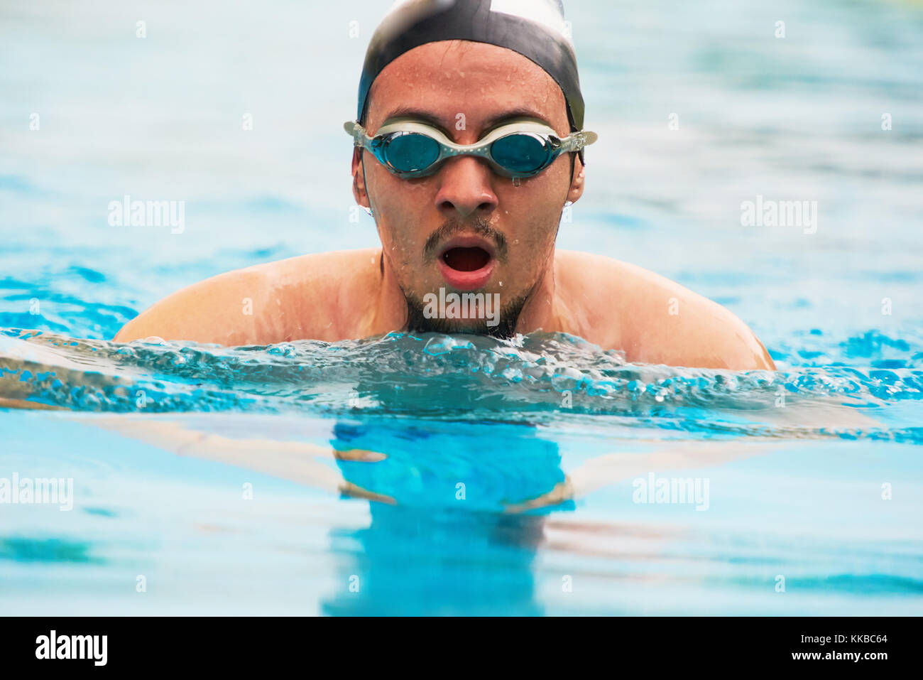 Wet swimming sport man. Close-up face of sport man Stock Photo