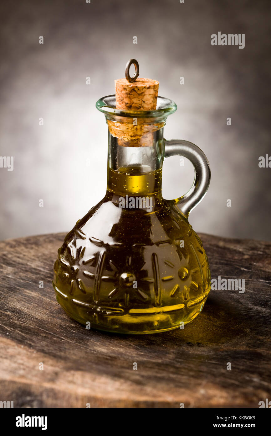 photo of delicious extra virgin olive oil inside a glass bottle Stock ...