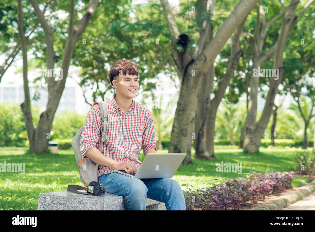 Student studying in park using hi-res stock photography and images - Alamy
