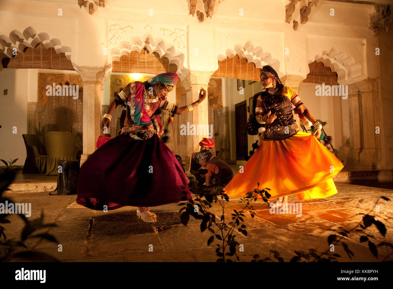 Rajastani dancers perform a traditional folk dance with live musicians at Castle Bijaipur, Bijaipur, Rajasthan, India Stock Photo