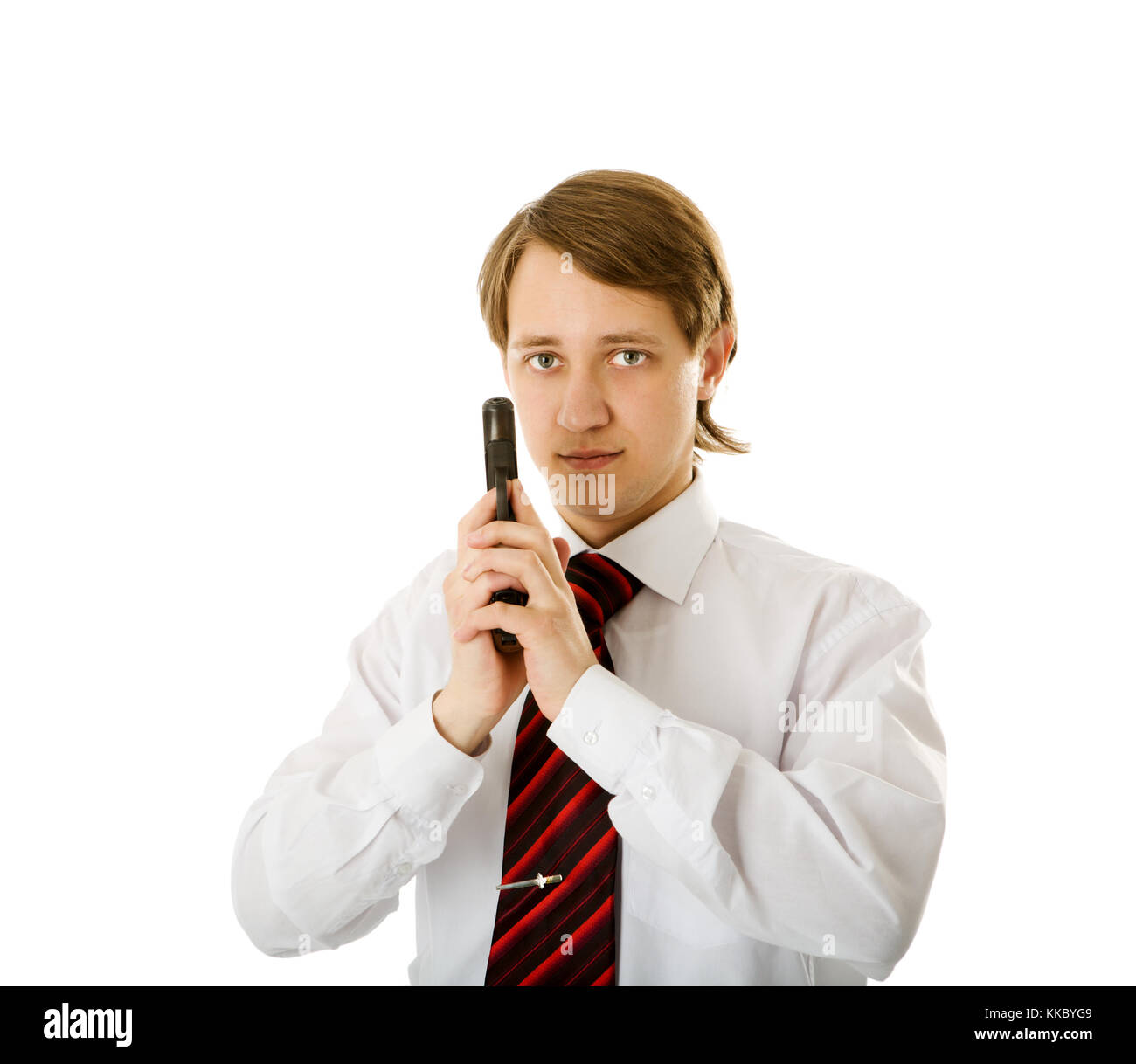 Portrait of handsome Young man holding gun isolated Stock Photo - Alamy