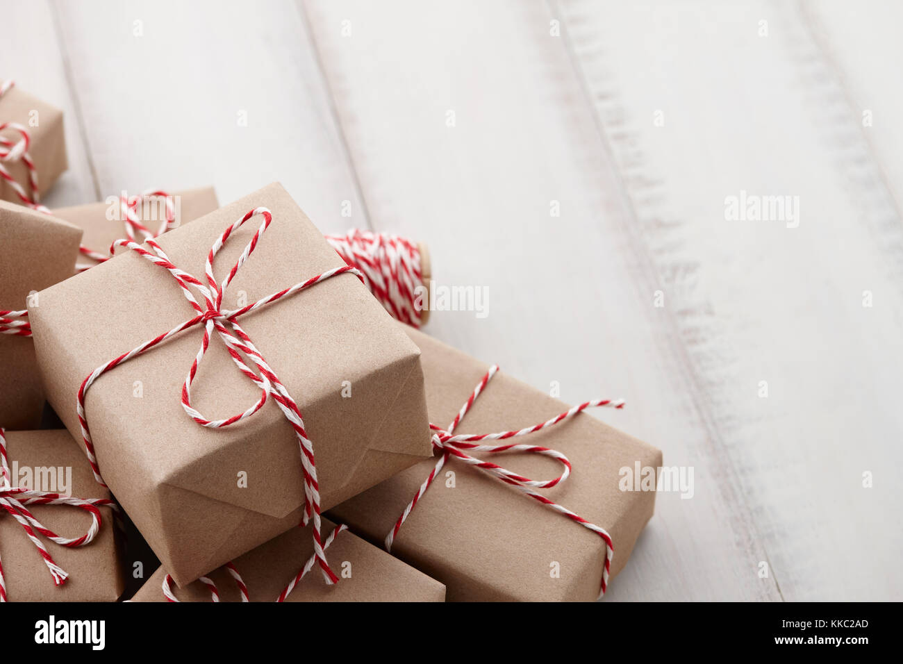 Christmas gift or present boxes wrapped in kraft paper Stock Photo Alamy