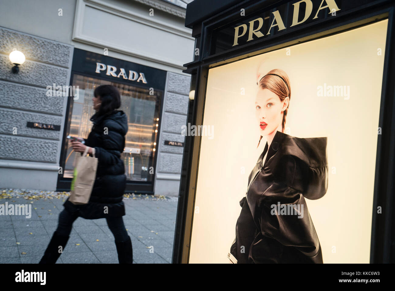 Glass display cabinet for luxury boutique Prada on famous shopping street Kurfurstendamm , Kudamm, in Berlin, Germany. Stock Photo