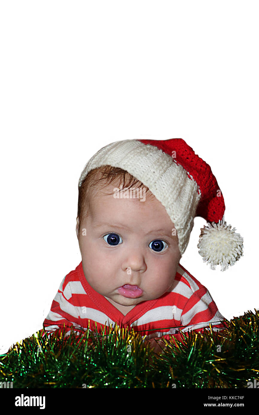 Cute Santa baby with dumbfounded face dressed in red sanata hat and stripped red jacket  isolated on white background. Can be used for design of banne Stock Photo