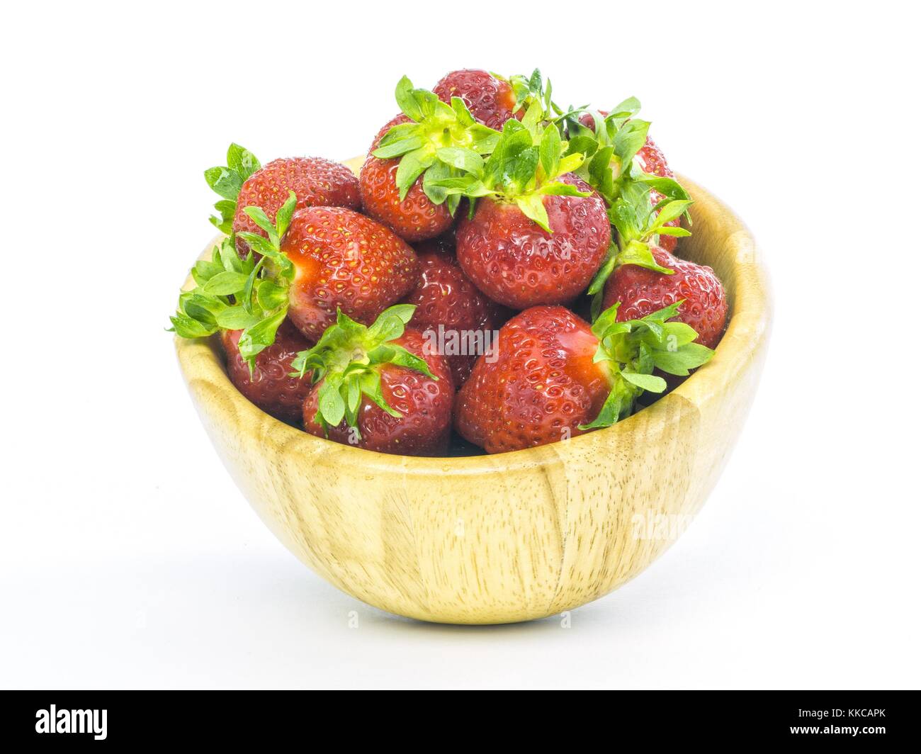 fresh whole strawberries in wooden bowl Stock Photo - Alamy
