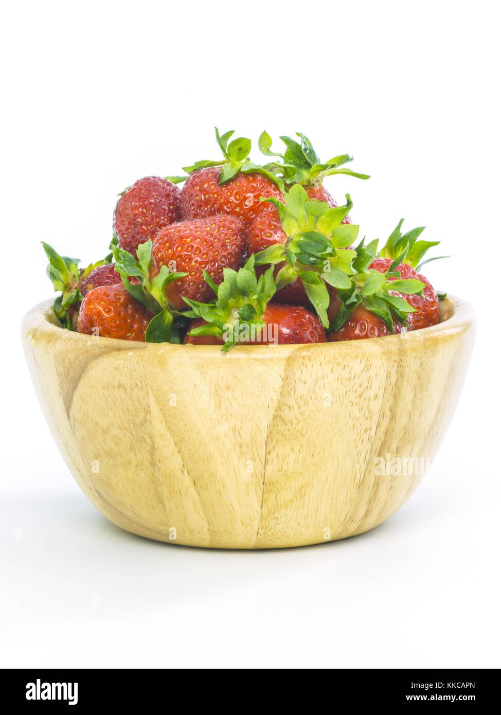 fresh whole strawberries in wooden bowl Stock Photo - Alamy