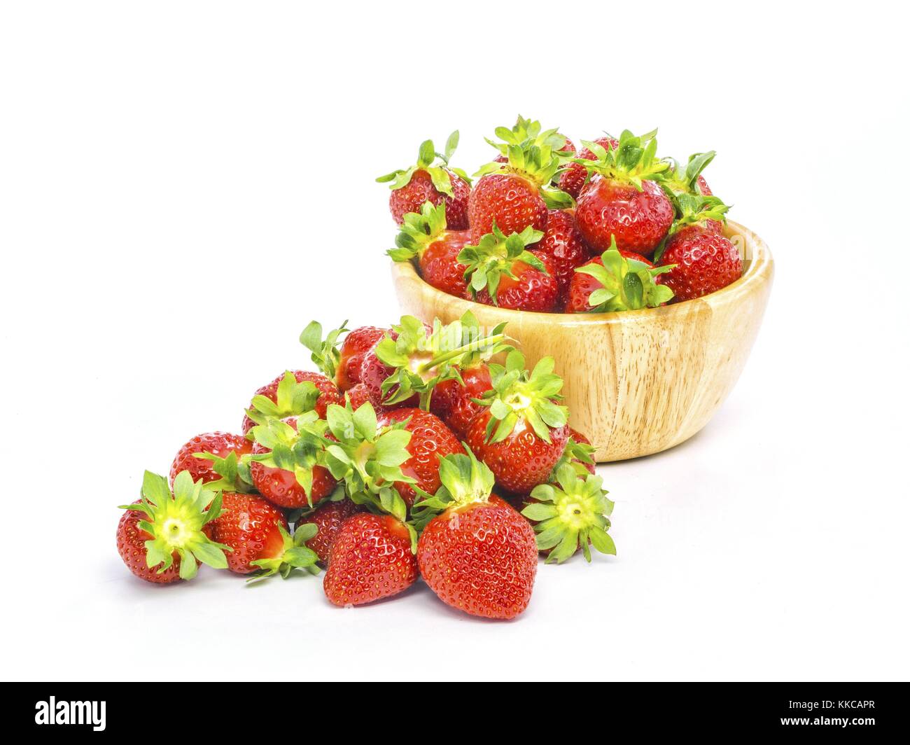 fresh whole strawberries in wooden bowl Stock Photo - Alamy