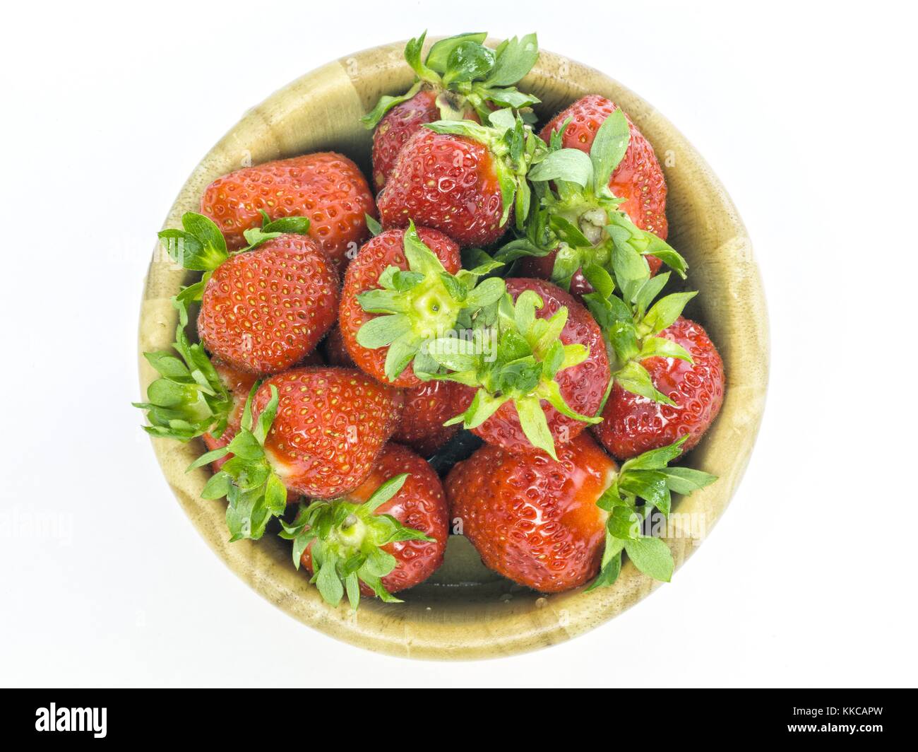 fresh whole strawberries in wooden bowl Stock Photo - Alamy