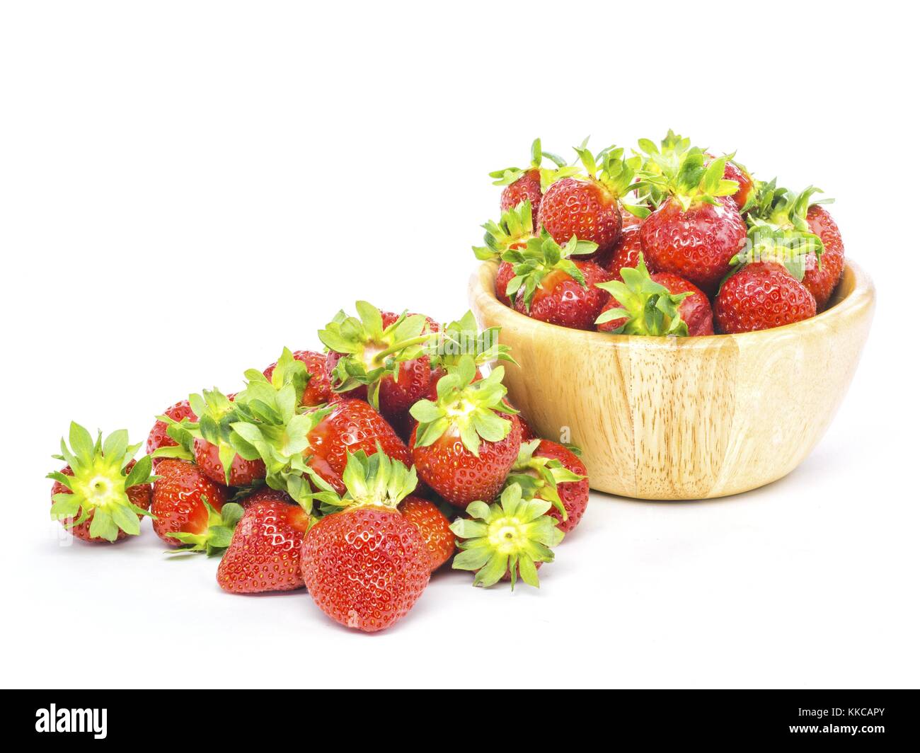 fresh whole strawberries in wooden bowl Stock Photo - Alamy
