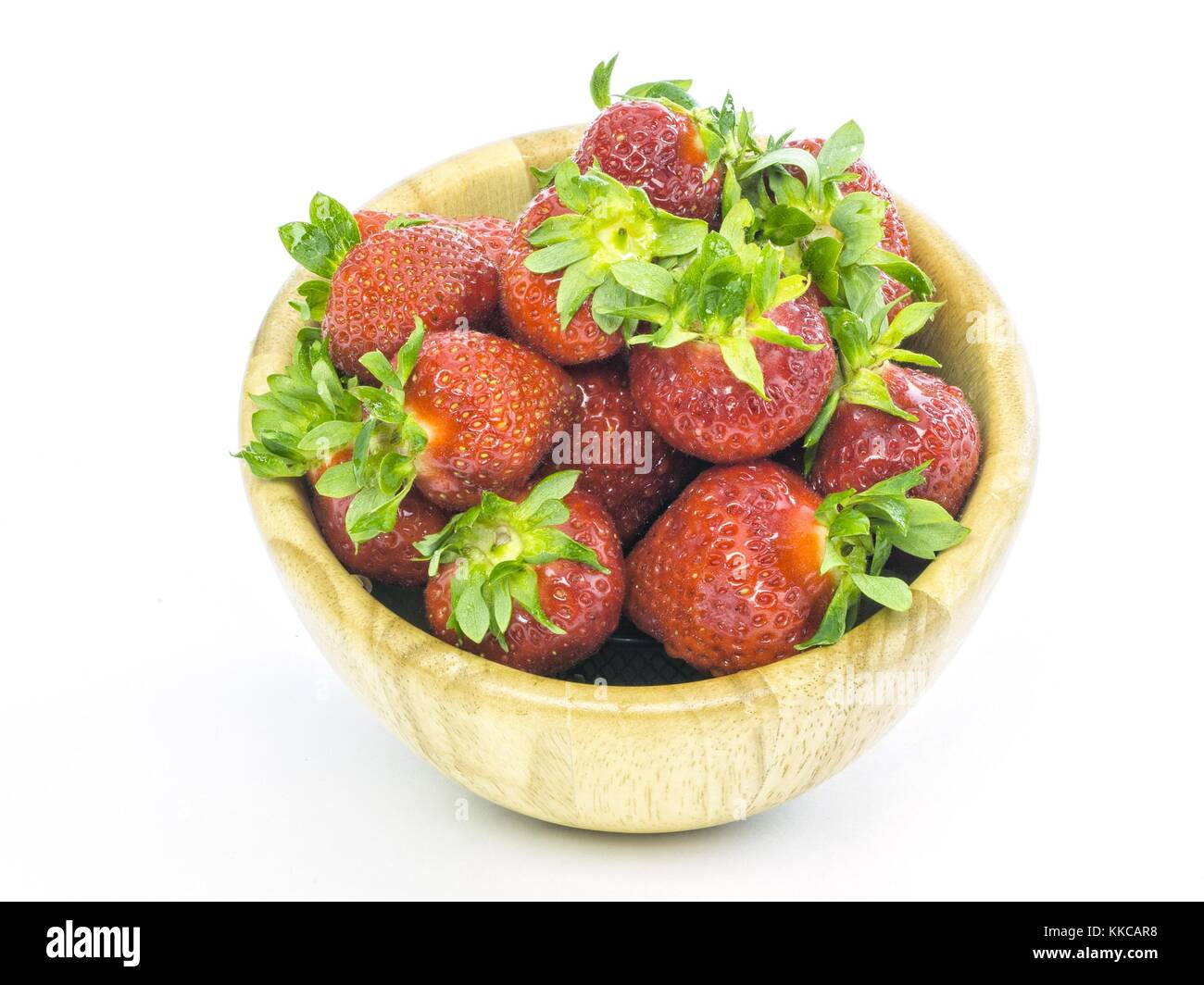fresh whole strawberries in wooden bowl Stock Photo - Alamy