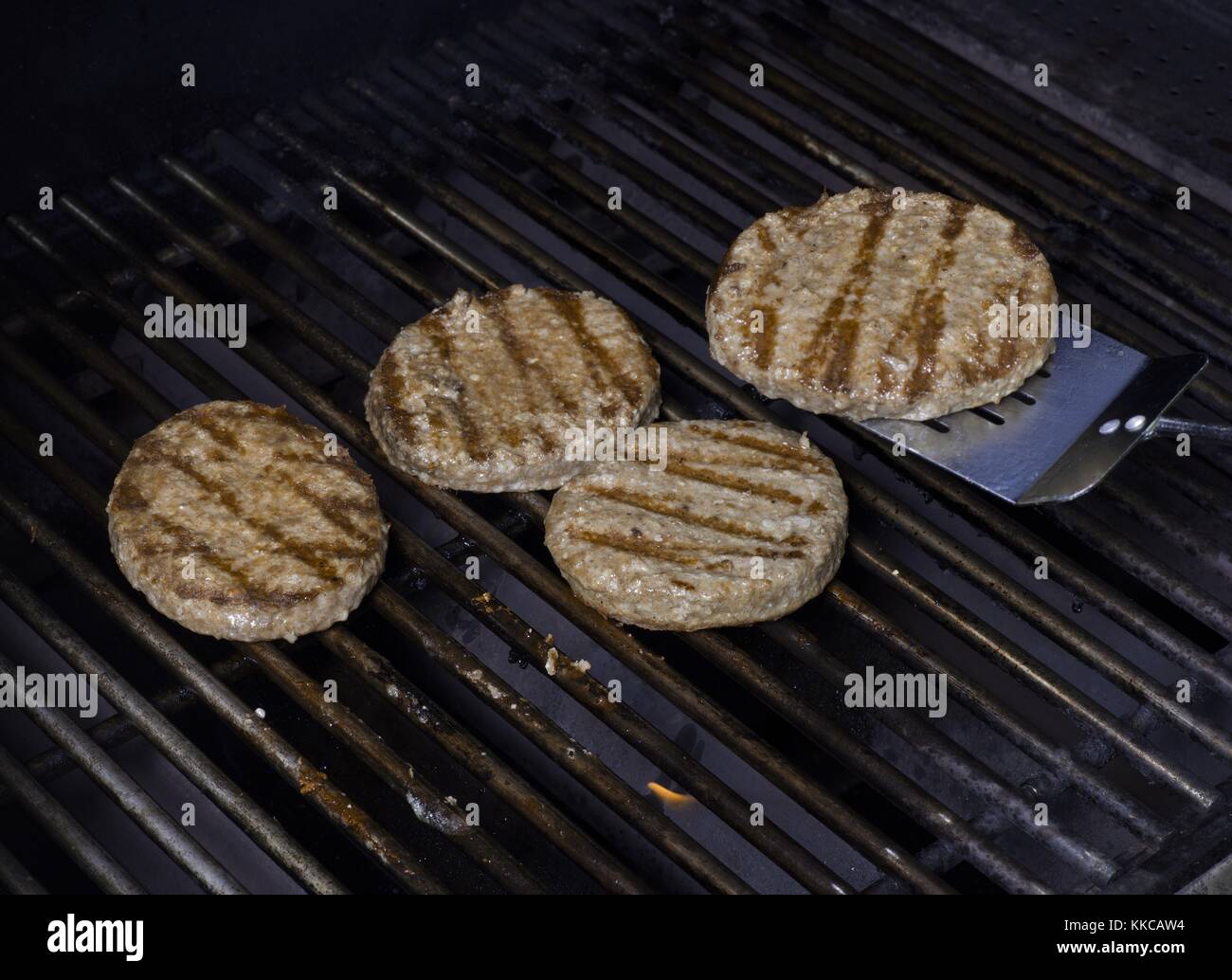 grilling burger patties Stock Photo Alamy
