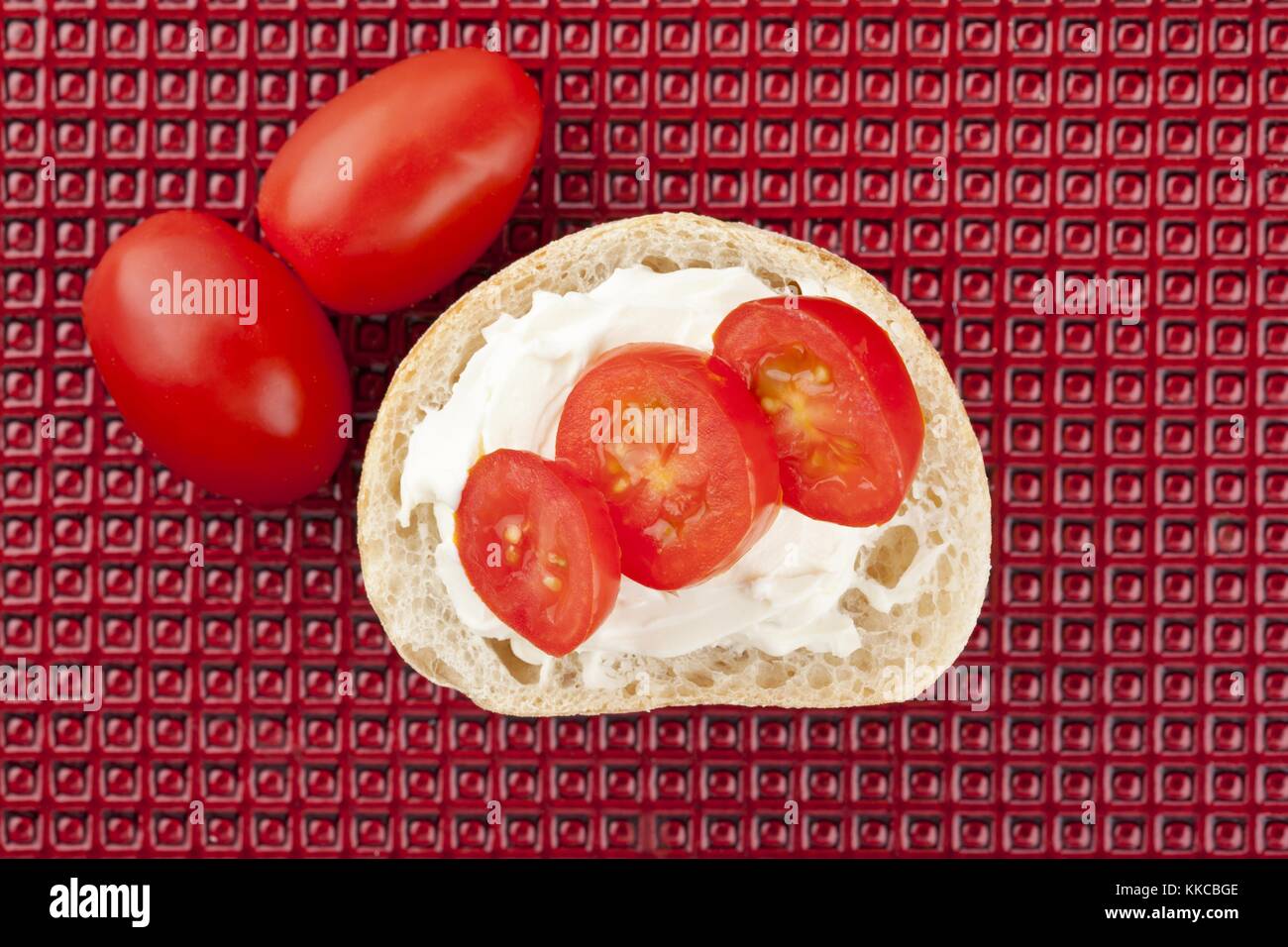 tomatoes in butter bread Stock Photo Alamy