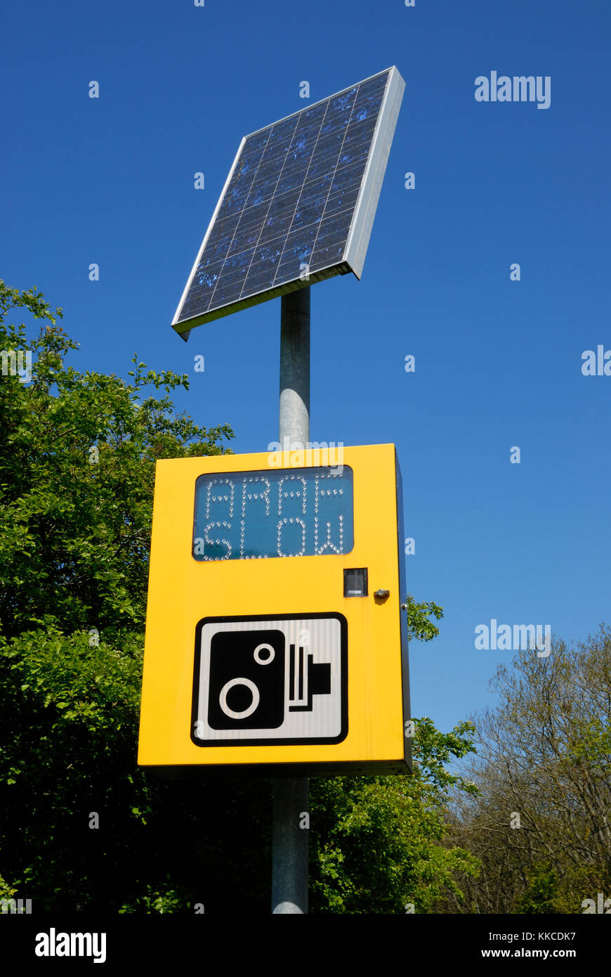 Solar panel powered, illuminated road speed warning sign, Wales Stock Photo