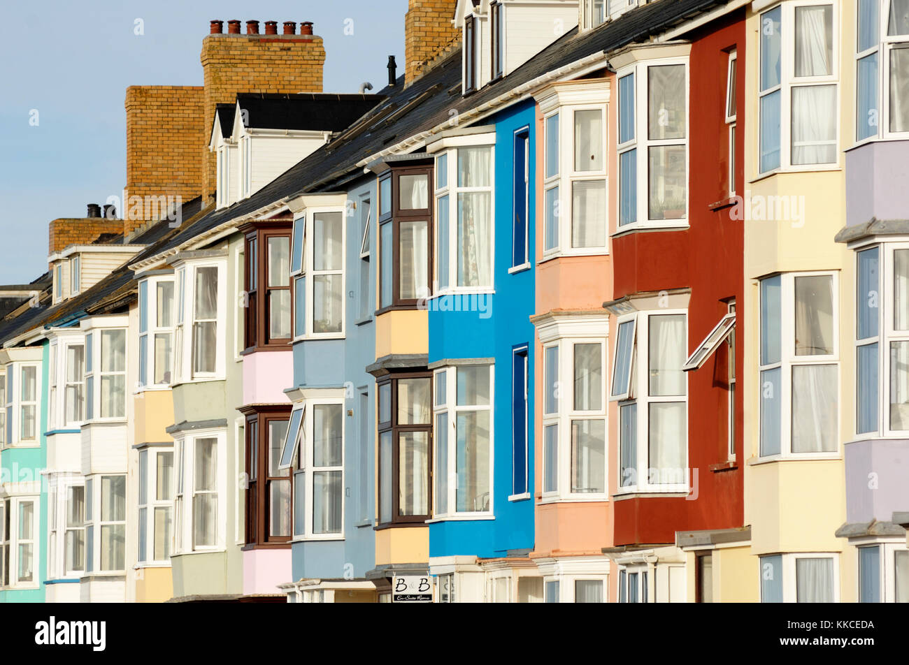 Brightly coloured seafront housing in Aberystwyth, Wales Stock Photo