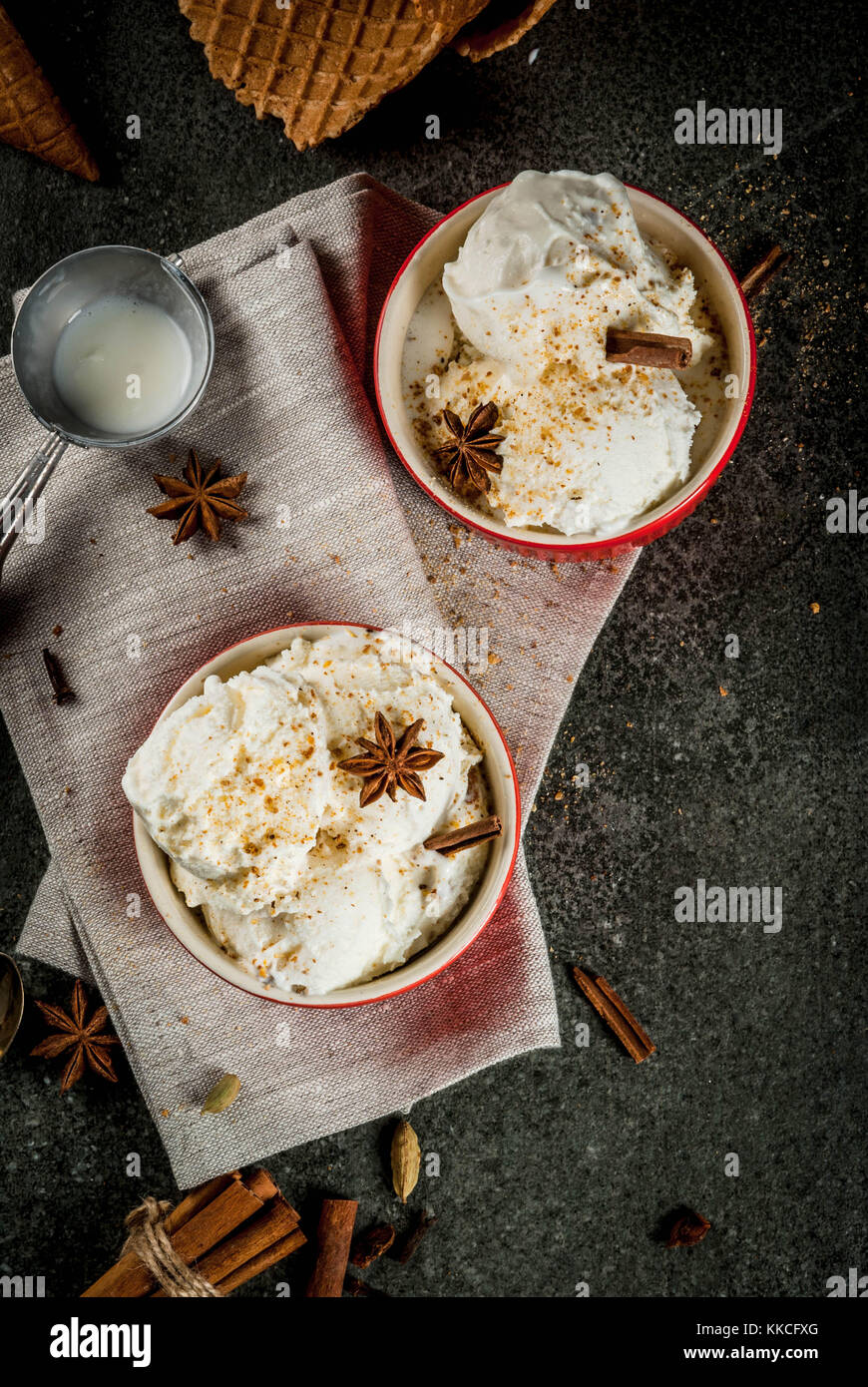 Cold Homemade Eggnog Ice Cream with Cinnamon and anise, on dark stone