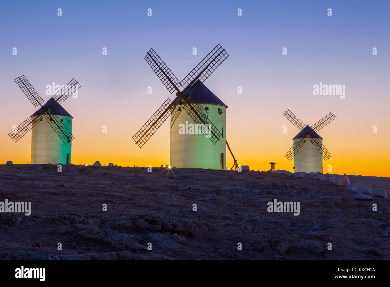 Illumintaed traditional windmills at rising, Campo de Criptana, Spain Stock Photo