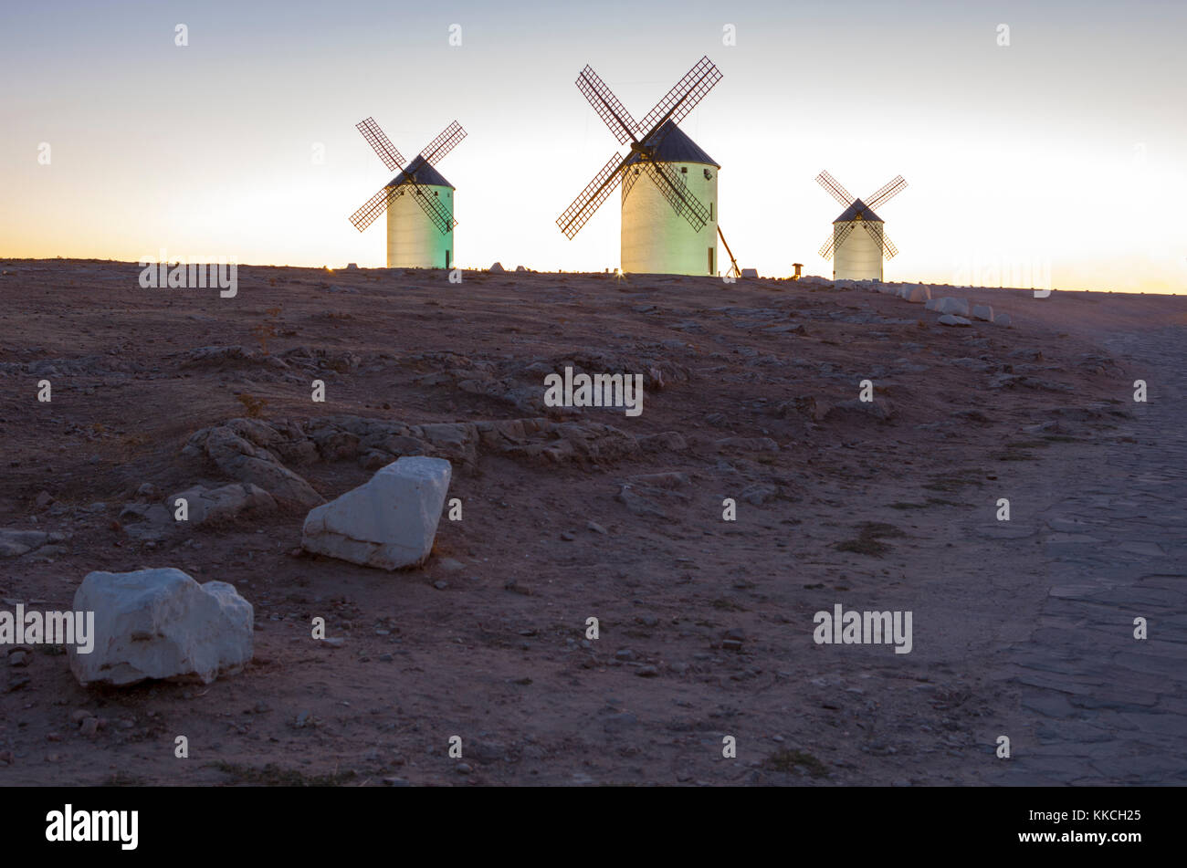 Illuminated traditional windmills at rising, Campo de Criptana, Spain Stock Photo