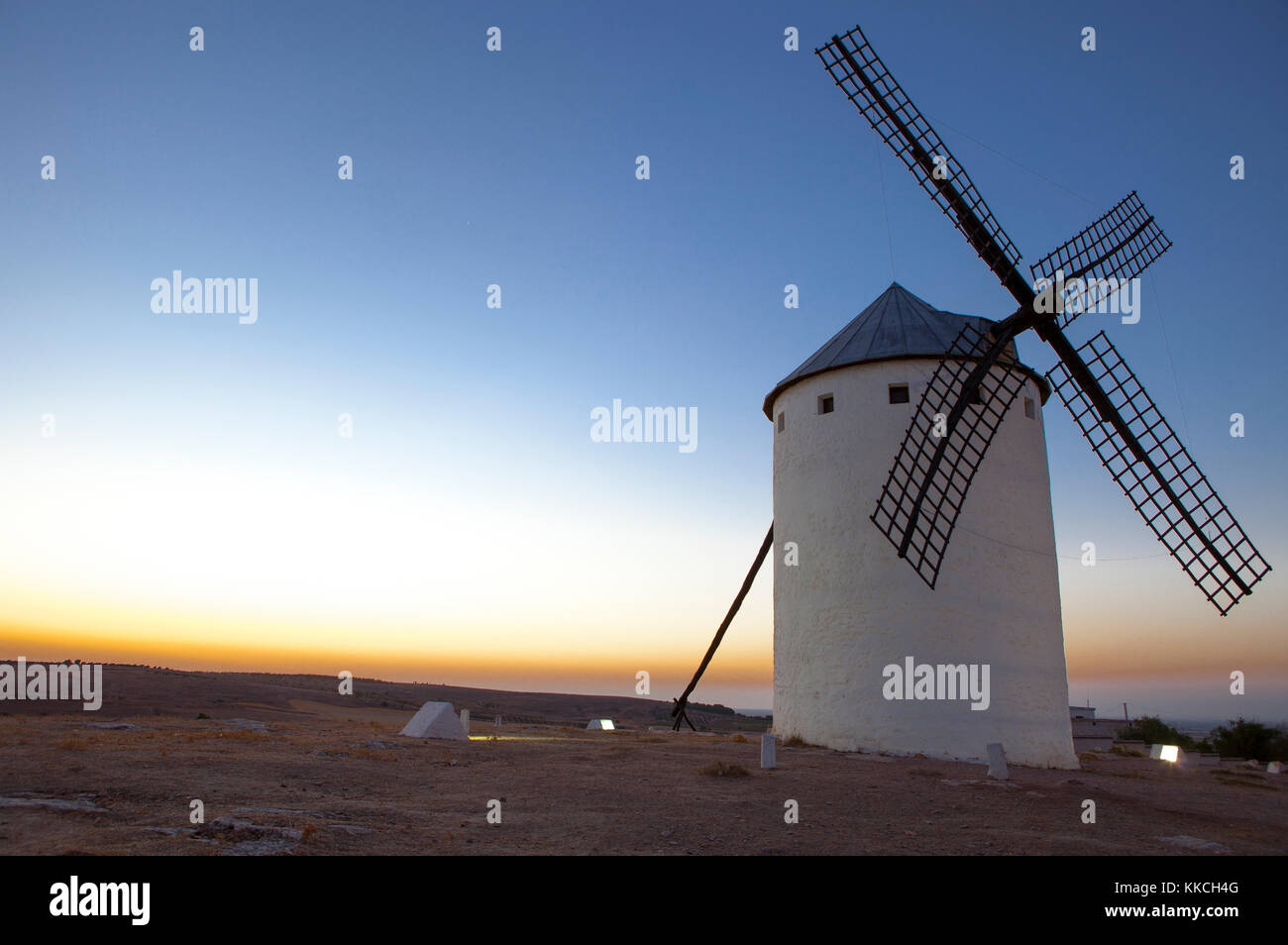 Illuminaed traditional windmill at rising, Campo de Criptana, Spain Stock Photo