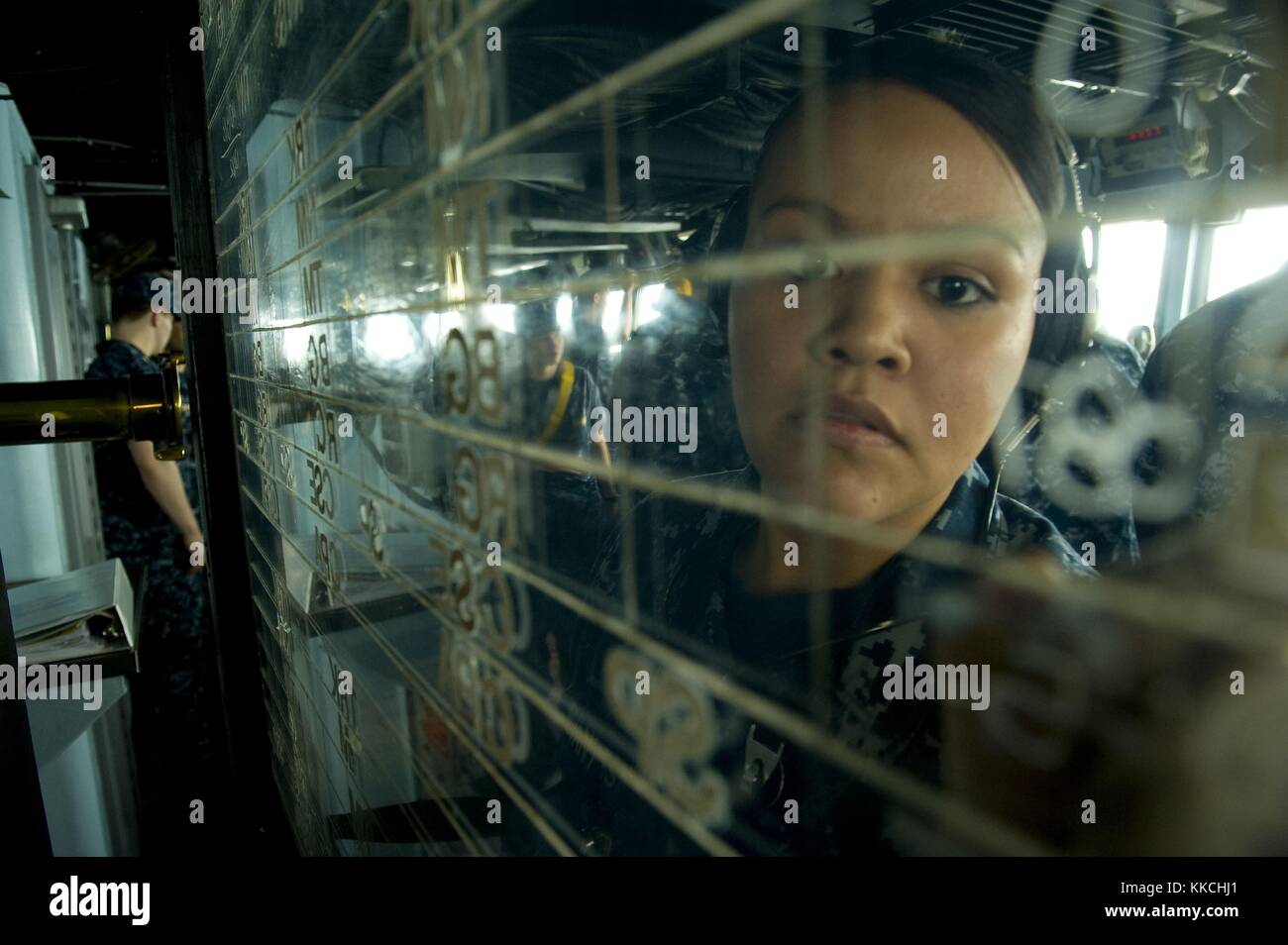 Operations Specialist Seaman Lorraine Cervantes writes on the status board in the pilothouse aboard the US 7th Fleet flagship USS Blue Ridge LCC 19 as the ship prepares for arrival in Laem Chabang, Thailand, Laem Chabang, Thailand. Image courtesy Mass Communication Specialist 3rd Class Fidel C. Hart/US Navy. 2012. Stock Photo