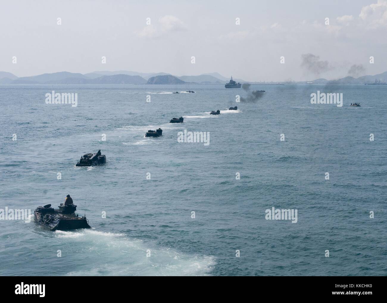 Marines assigned to 4th Marine Regiment drive their amphibious assault vehicles from the amphibious dock landing ship USS Germantown LSD 42 during a rehearsal for a joint US and Royal Thai Navy beach landing, Pacific Ocean. Image courtesy Ensign Jason M. Tross/US Navy. 2012. Stock Photo