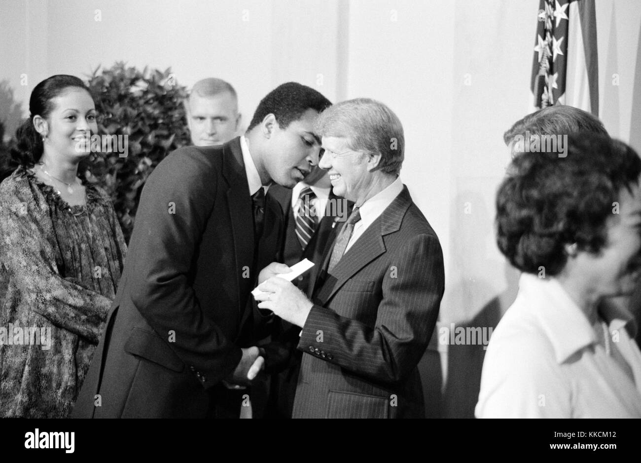 United States President greets boxer Muhammad Ali at a white house dinner celebrating the signing of the Panama Canal Treaty, Washington DC. Image courtesy Marion Trikosko/Library of Congress. September 7, 1977. Stock Photo