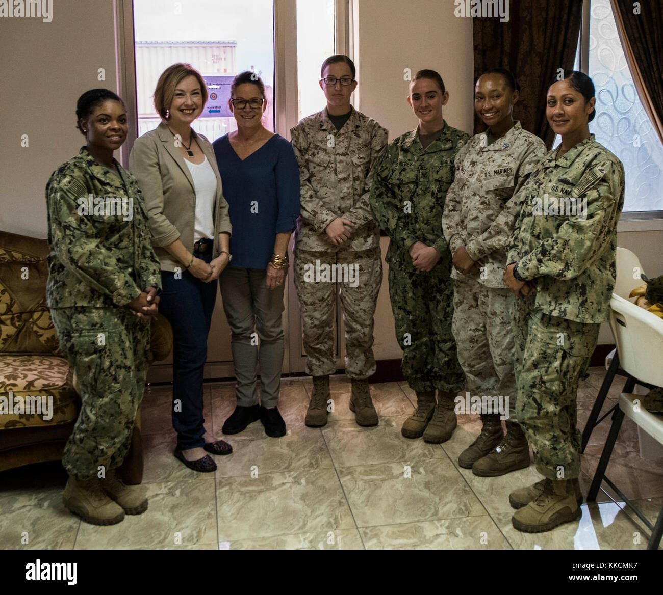 The Secretary of the Navy Richard V. Spencer and his wife, Mrs. Sarah Pauline Finch Spencer, had breakfast with troops and toured Camp Lemonnier’s facilities during a visit to the base, Nov. 24, 2017. While on base, Mrs. Spencer toured the Emergency Medical Facility, enlisted barracks, Fitness Center, Navy Exchange and galley. (U.S. Air National Guard photo by Staff Sgt. Allyson L. Manners) Stock Photo